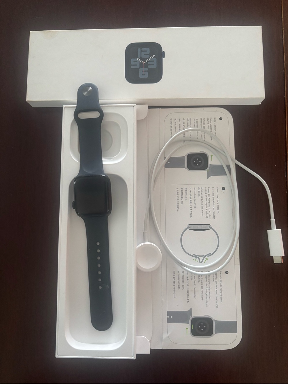 Brand new, never worn. Apple Watch SE 40mm Aluminum Case Ion x glass